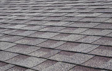 Slideslow tiles for shallow pitch roofing